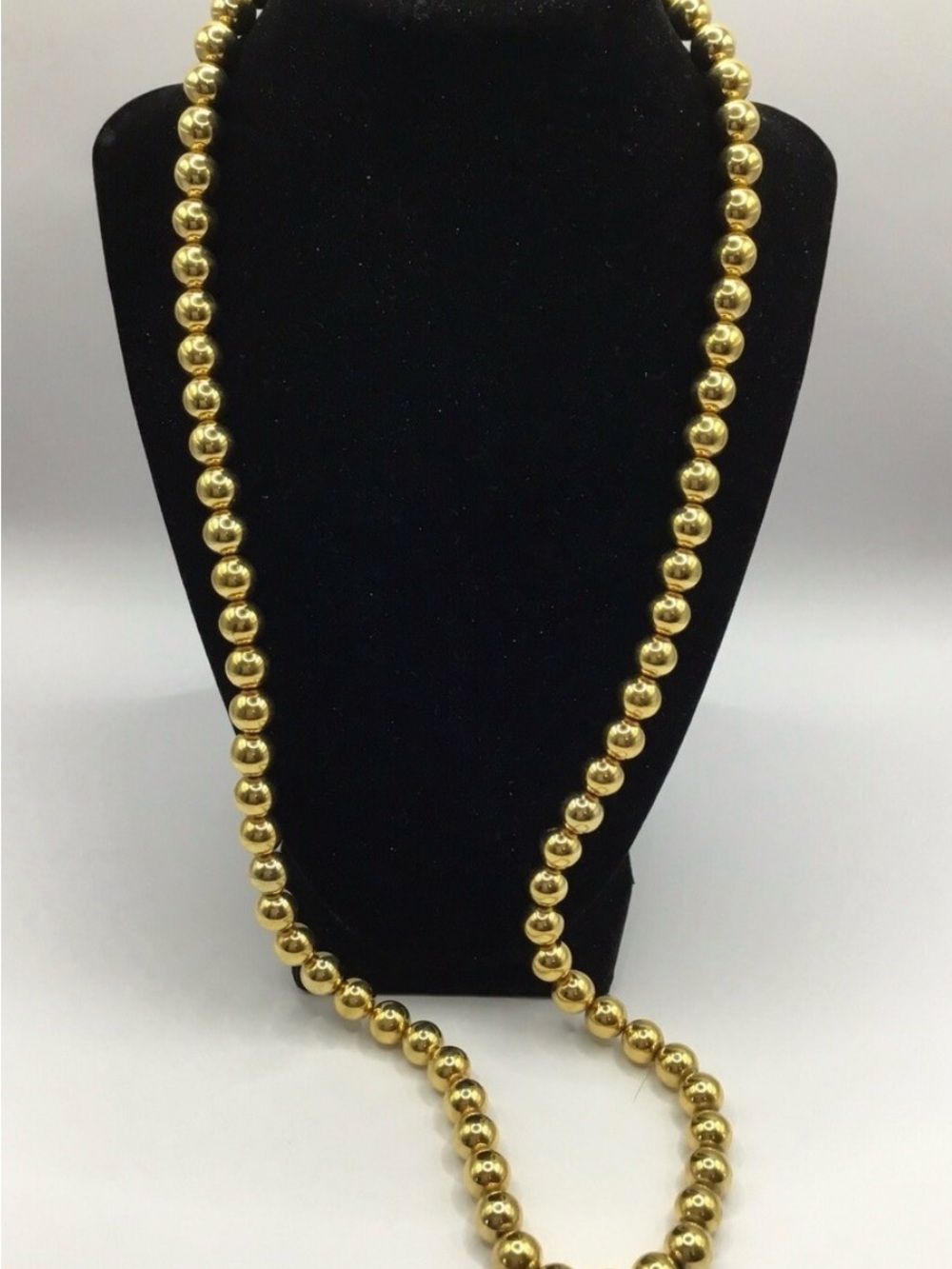 Napier 1980s gold-tone bead necklace,  31” featuring a foldover clasp